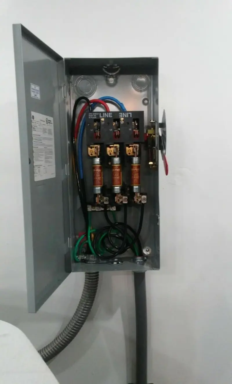 Three-phase disconnect switch installed for Smoke Detector Installation in Williston